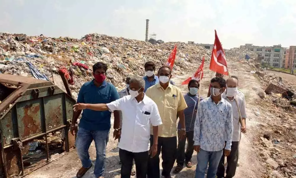 CPM leader Ch Babu Rao inspecting the garbage transfer station at Singh Nagar in Vijayawada on Monday