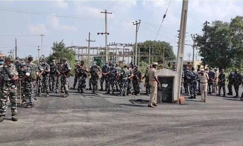 Central forces on poll duty at Kamalapur mandal headquarters in Hanumakonda district on Monday