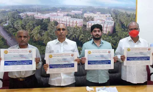 SRKR Engineering College secretary and correspondent Sagi Vithal Ranga Raju, CEO SRK Nishant Varma, principal Dr M Jagapati Raju, Dr V Chandrasekhar and NK Kameswara Rao releasing the poster on the short-term training programme on Big Data Analytics at the college on Monday