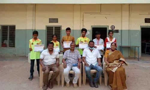 SKPVV Hindu High School headmaster K Srinivasa Rao speaking to media persons in Vijayawada on Monday