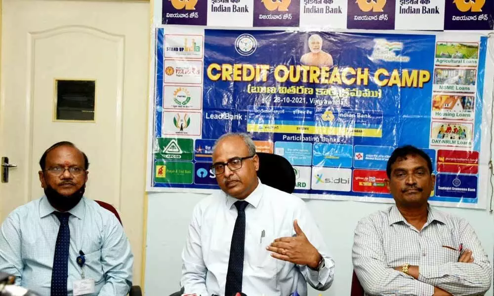 Indian Bank deputy general manager KV Rajasekhar Rao, lead bank district manager  K Ramamohan Rao, SBI officer KS Sriramamurthy addressing the media on Credit Outreach Camp in Vijayawada on Tuesday