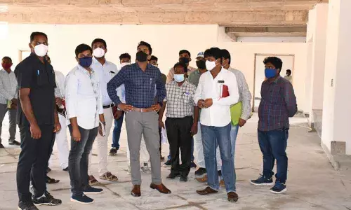 District Collector D Anudeep inspecting new Collectorate building works at Palvoncha on Tuesday