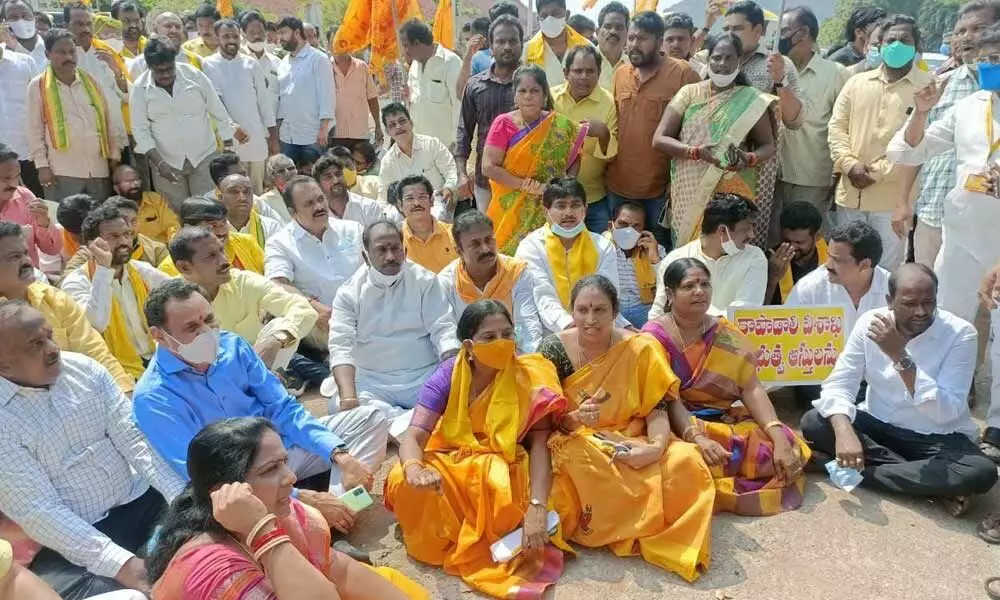 TDP leaders staging a protest at Rushikonda in Visakhapatnam on Wednesday