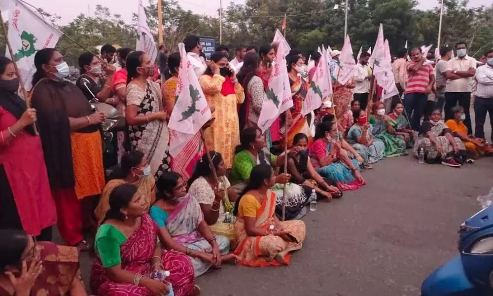 Visakha Ukku Parirakshana Porata Committee womens wing staging a protest in Visakhapatnam on Wednesday