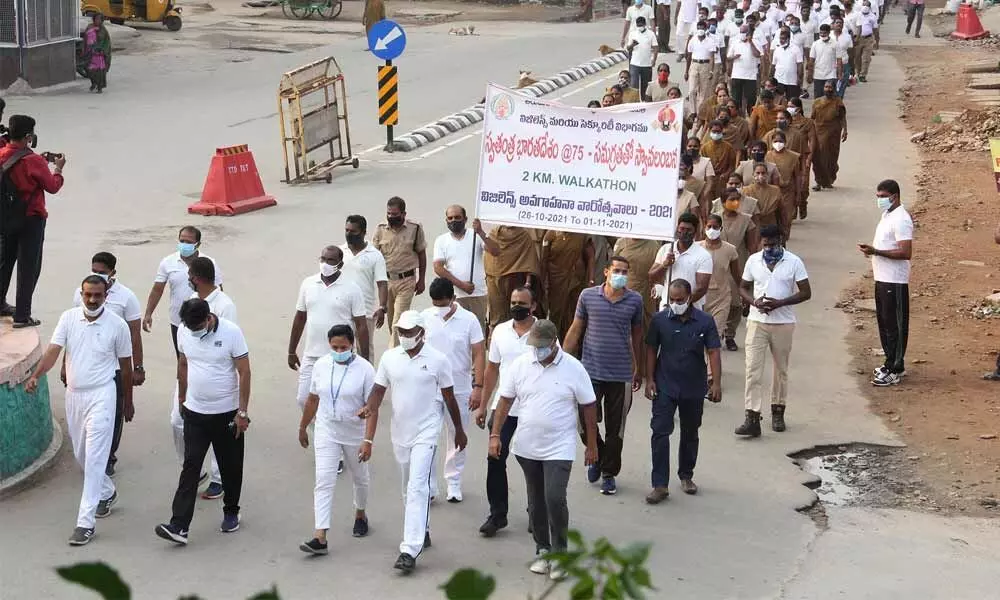 TTD vigilance and security staff and others taking out a walkathon on the occasion of National Vigilance Week in Tirupati on Wednesday.