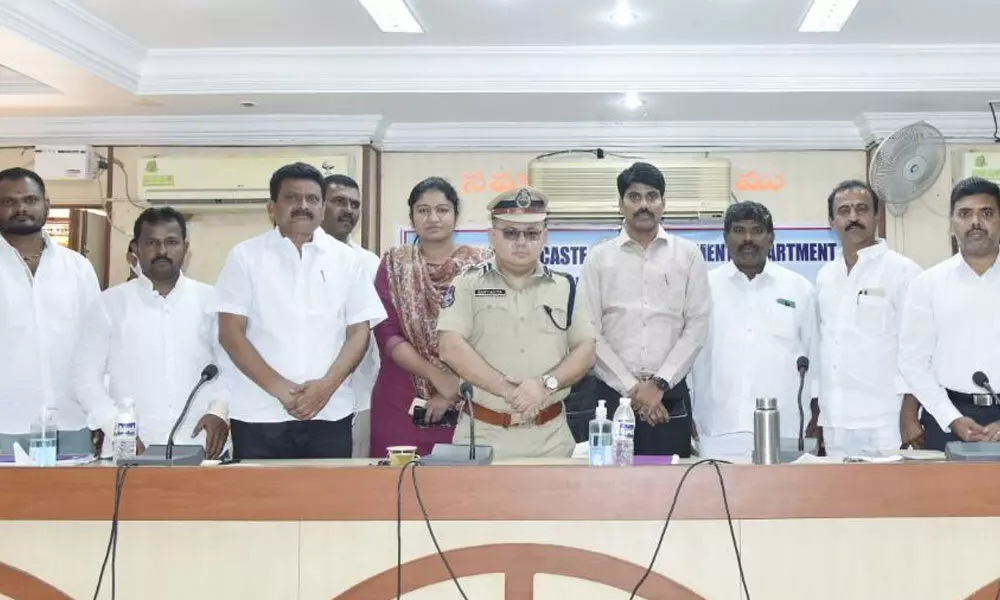 District Collector C Narayana Reddy and Commissioner of Police Karthikeya at a review meeting at the conference hall of Nizamabad Collectorate on Wednesday