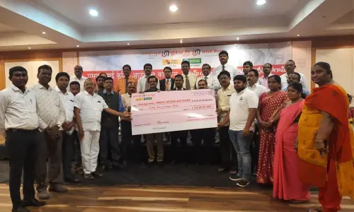 Union Bank of India deputy general manager A Ravikumar and others disbursing loans in Guntur on Wednesday