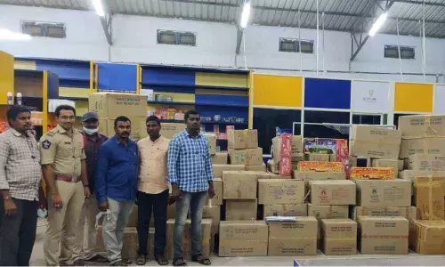 Task force police with the seized crackers on Thursday