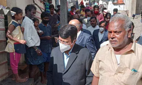 Chairman of the Andhra Pradesh Commission for Backward Classes A Sankara Narayana visiting a colony during his visit to Visakhapatnam to understand the ground realities on Saturday