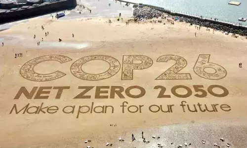 A giant sand artwork adorns New Brighton Beach. (Christopher Furlong/Getty Images)