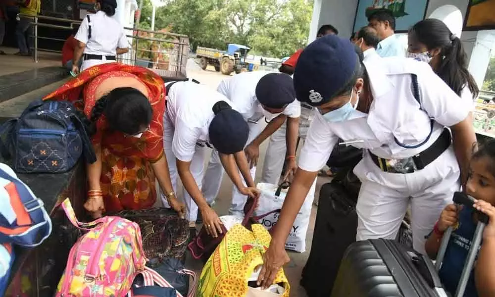 Ahead of Diwali, civil defence personnel checking luggage of the passengers at the railway station in Visakhapatnam on Tuesday
