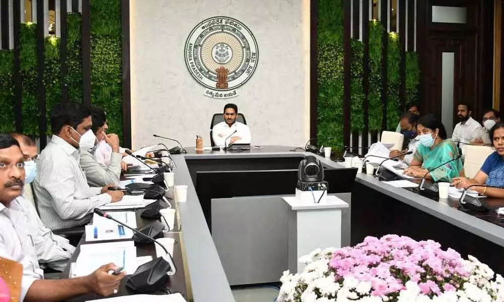 Chief Minister Y S Jagan Mohan Reddy reviews schemes aimed at raising living standards of people including infrastructure programme at his camp office in Tadepalli on Tuesday