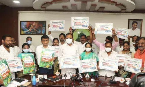 MLA Bhumana Karunakar Reddy along with Mayor Dr R Sirisha and Municipal Commissioner P S Girisha releasing the poster of  national-level kabaddi tournament at the municipal office in  Tirupati on Tuesday