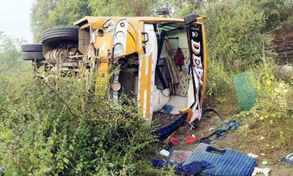 17 injured after a private bus turns turtle in Nirmal