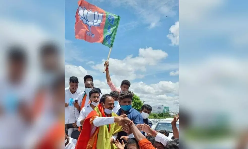 BJP leader Eatala Rajender with the public after winning Huzuraba by-election