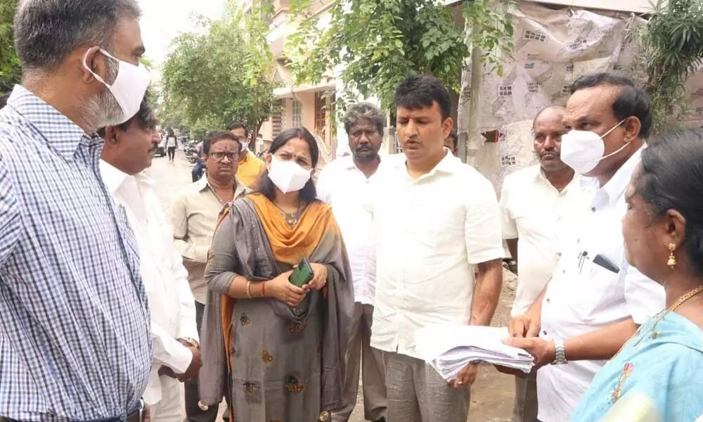 Municipal Commissioner P S Girisha and Mayor Dr R Sirisha inspecting rain-hit areas in Tirupati on Wednesday