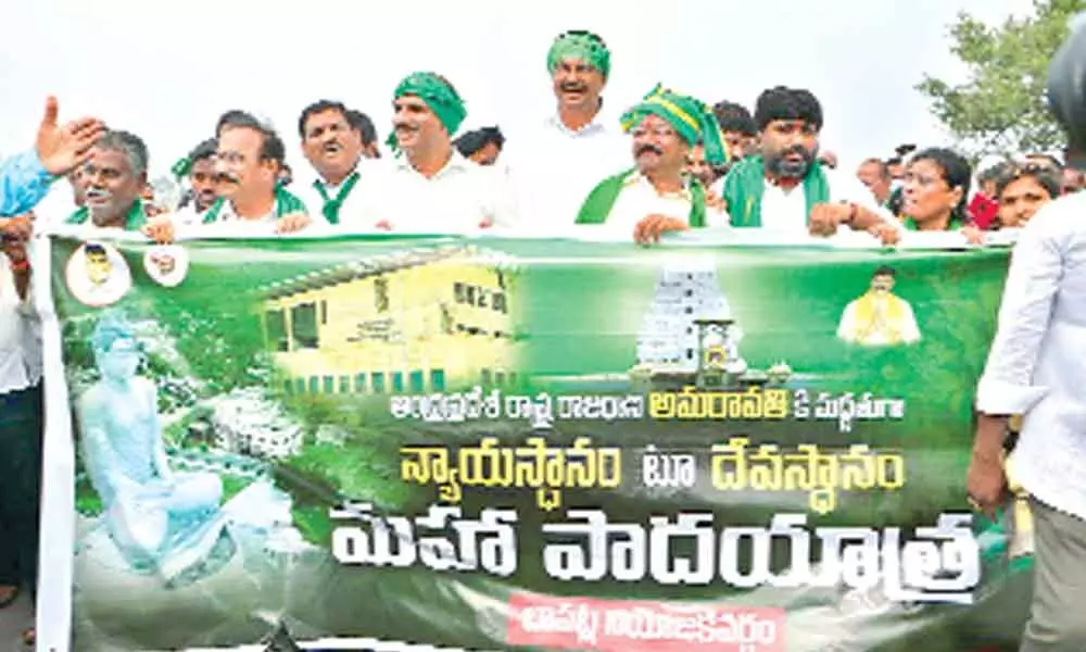 TDP leaders from Prakasam district welcoming the Nyayasthanam to Devasthanam Padayatra at Chinanandipadu village on Saturday