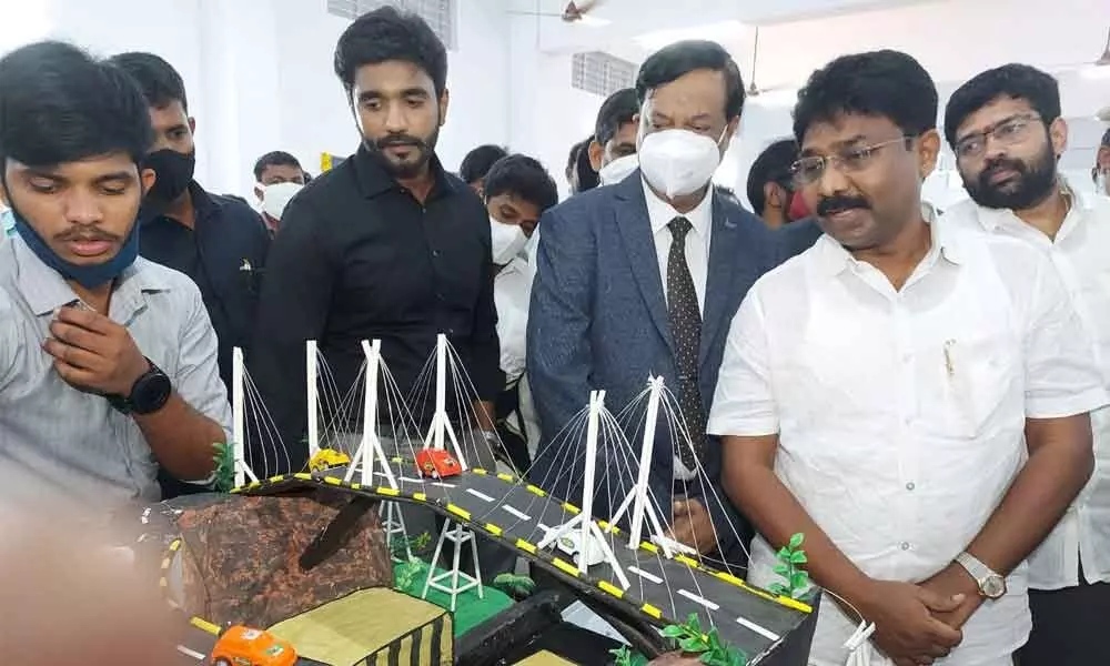 Education Minister Audimulapu Suresh having a look at models on display after inaugurating the Civil  & Mechanical workshop building at Adikavi Nannaya University  (AKNU) in Rajamahendravaram  on Saturday