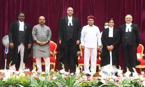 Three additional judges take oath