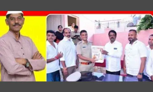 Protest against police for accepting gifts from BJP leader