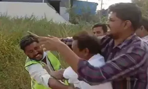 Officials thrashed during demolition