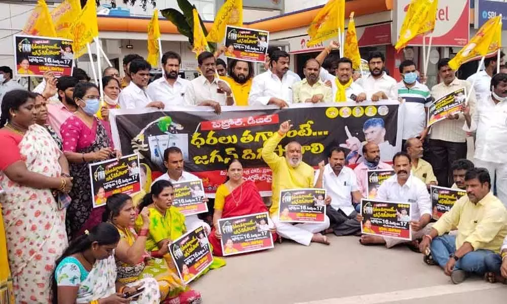 TDP leaders staging a protest against the hike in fuel prices in Tirupati on Tuesday