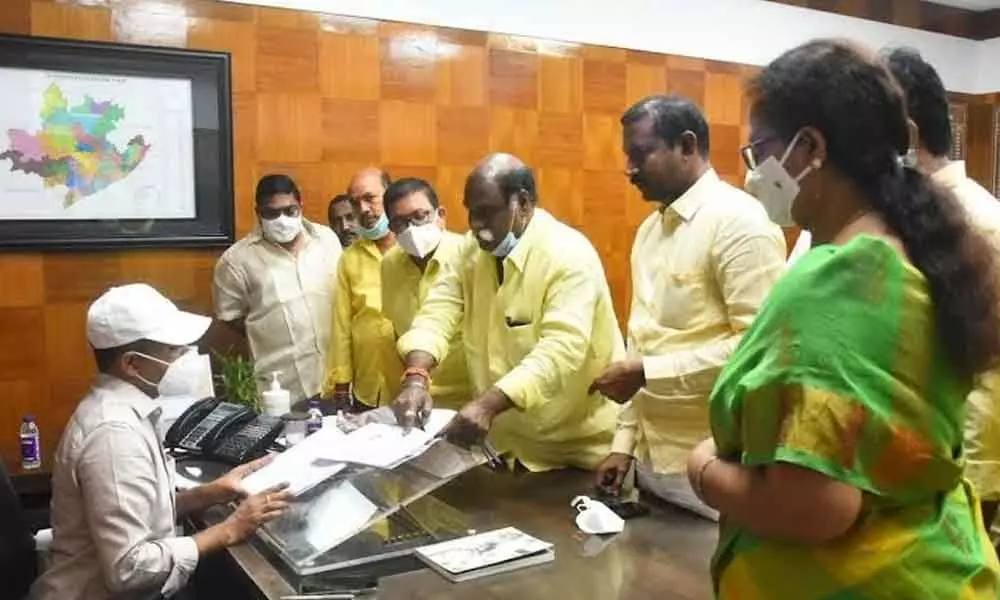 TDP leaders submitting a complaint on change of symbols to District Collector A Mallikarjuna in Visakhpatnam on Monday