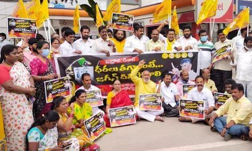 TDP leaders staging a protest against the hike in fuel prices in Tirupati on Tuesday
