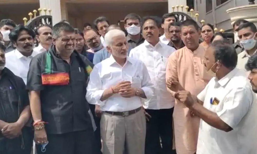 MP V Vijayasai Reddy addressing the fishermen who gathered at his Seethammadhara office in Visakhapatnam on Wednesday