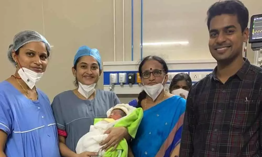 Doctors with District Collector D Anudeep and baby boy at Bhadrachalam Hospital on Wednesday