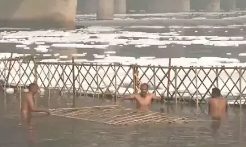 Barricades Being Installed In The Yamuna To Prevent Harmful Foam From Floating
