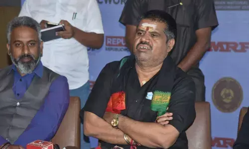 Tourism Minister M Srinivasa Rao speaking at the conference in Visakhapatnam on Wednesday