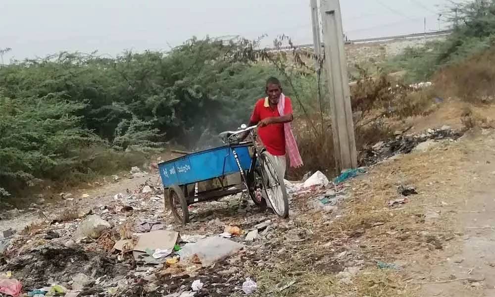 Household collected garbage is being dumped on the roadside at Panchalingala village