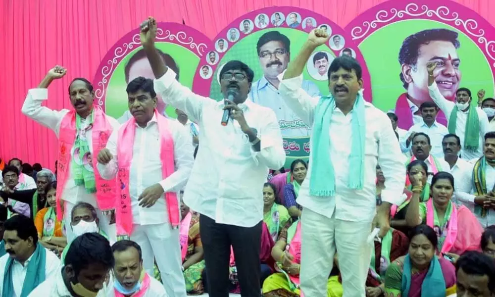 Minister for Transport Puvvada Ajay Kumar addressing the people during a protest event held in Khammam on Friday