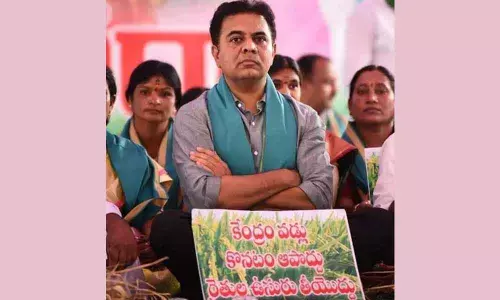TRS working president KT Rama Rao on dharna in Siricilla on Friday demanding paddy procurement by the Centre