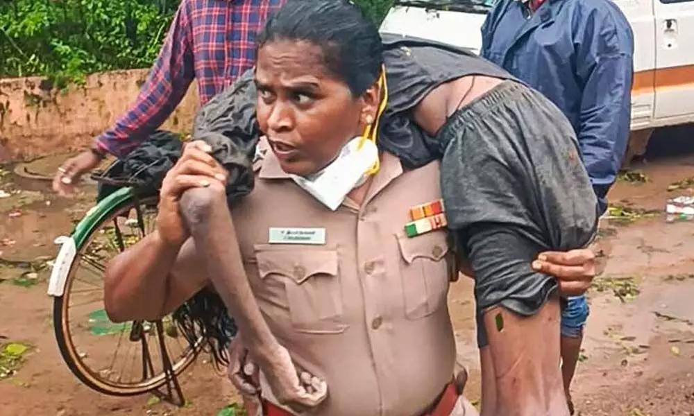 MK Stalin felicitates woman police officer who saved man during Chennai rains