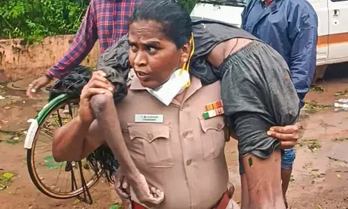 MK Stalin felicitates woman police officer who saved man during Chennai rains