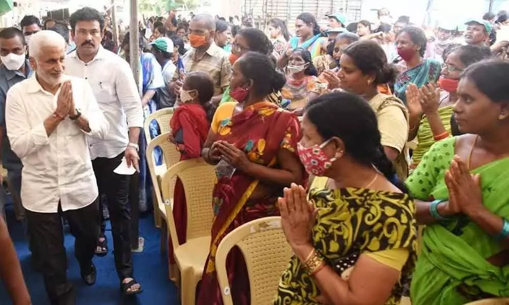 MP V Vijayasai Reddy and NREDCAP Chairman K K Raju at a campaign in Visakhapatnam.