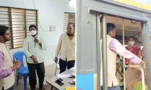 Sub-Collector G Surya Sai Praveen Chand interacting with the election staff in Jaggaiahpet on Sunday