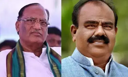 Gutha Sukhender Reddy and Madhusudhana Chary