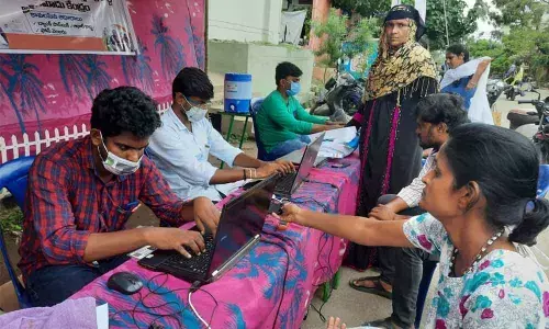 Vijayawada: Workers in droves register for insurance cover