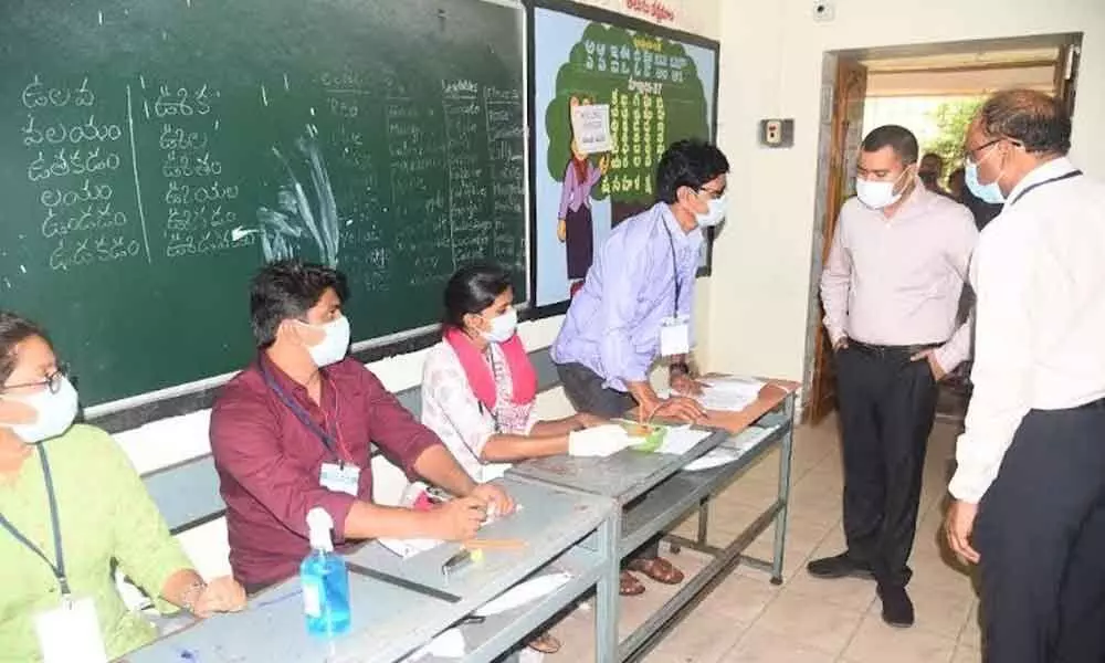 District Collector A Mallikarjuna examining the polling exercise at a station during the GVMC by-polls in Visakhapatnam on Monday