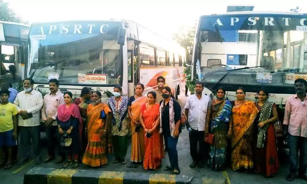 Passengers and APSRTC officials before boarding a special bus pressed into service for Karthika masam in Visakhapatnam