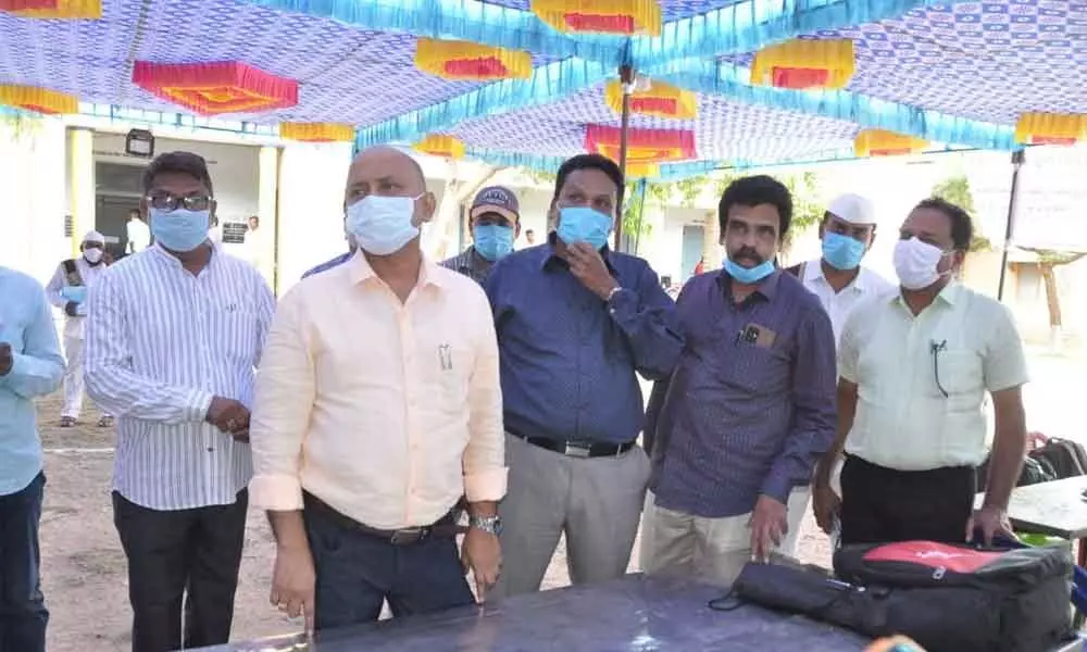 Election general observer Hari Jawahar Lal and Joint Collector M V K Srinivasulu inspecting the polling process in Bethamcherla on Monday