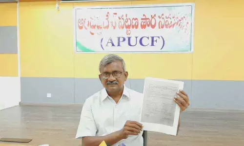 APUCF convenor Ch Babu Rao addressing the media persons in Vijayawada on Monday