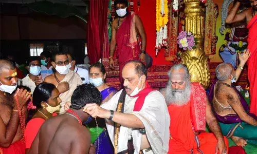 Devotees taking Bhavani deeksha at Sri Durgamalleswara Swamivari Devasthanam in Vijayawada on Monday 	Photo: Ch Venkata Mastan