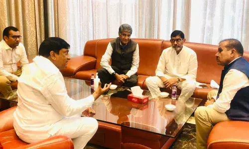 KRIBHCO chairman Dr Chandra Pal Singh Yadav, Managing Director Rajan Choudhary and Executive Director VSR Prasad discussing the setting up of plant on Monday