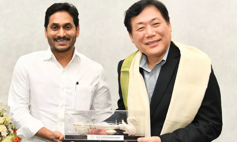 Chief Minister Y S Jagan  Mohan Reddy at his camp office on Tuesday felicitating Tae-Jin Park, newly-appointed Managing Director and CEO of Kia India