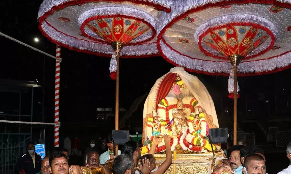 Lord Ugra Srinivasa Murthy along with His consorts being taken out in a procession at Tirumala on Tuesday