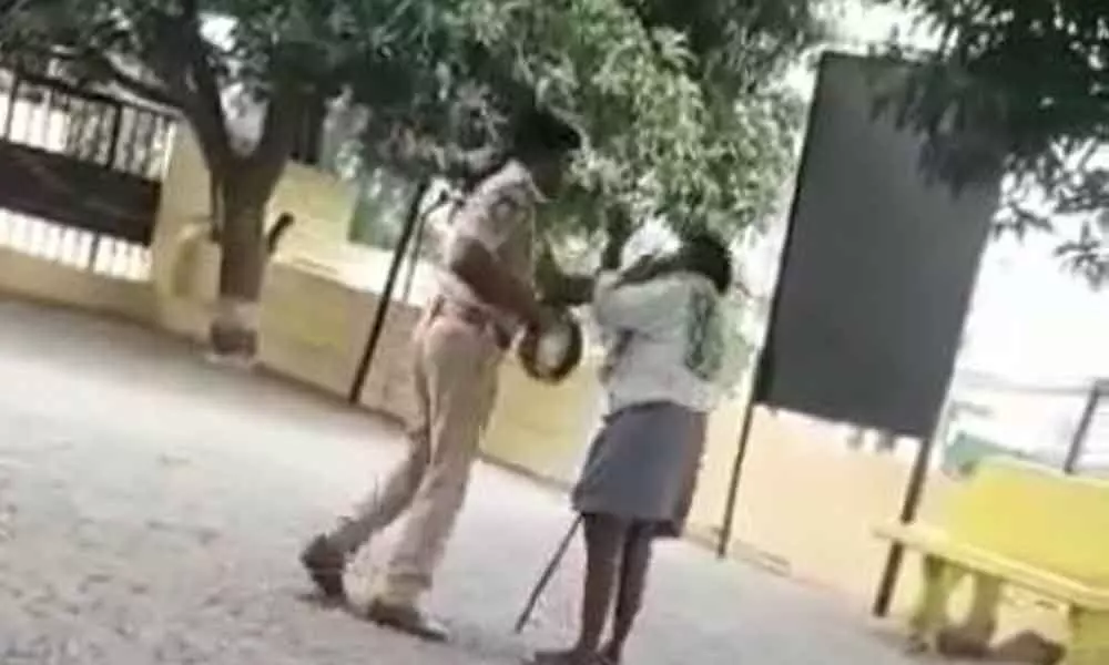 Veldanda SI Narasimha slapping a poor old man from dalit community at the police station